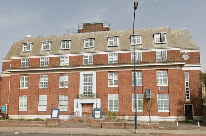 Catford police station, red brick locally listed building.